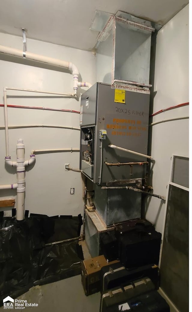 1084 Dunkirk Ave, Mount Morris, MI 48458 - utility room with heating unit