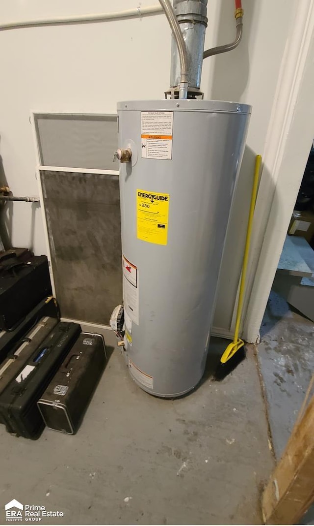 1084 Dunkirk Ave, Mount Morris, MI 48458 - utility room with gas water heater