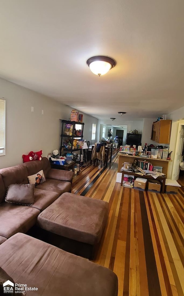 living room with hardwood / wood-style floors and bowling