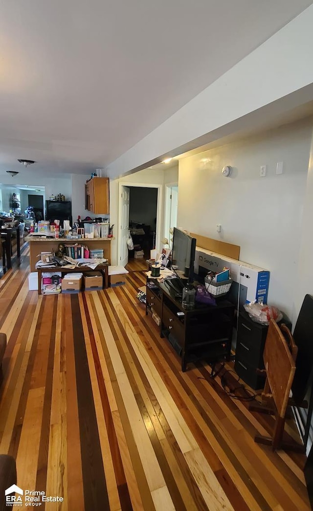1084 Dunkirk Ave, Mount Morris, MI 48458 - living room featuring wood finished floors and an office area