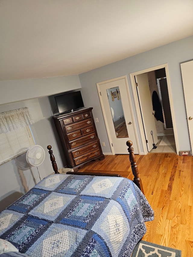 bedroom with light hardwood / wood-style flooring