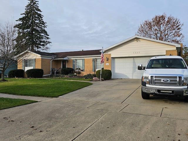 single story home with a front yard and a garage