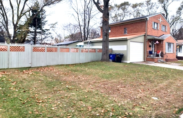 view of yard featuring a garage