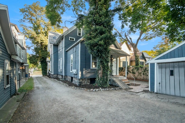 exterior space featuring an outbuilding