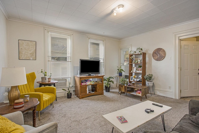 living room featuring crown molding and carpet floors