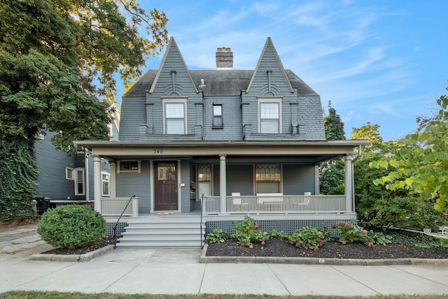 victorian-style house with covered porch