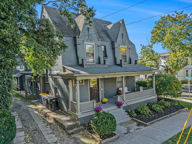 view of front of property featuring covered porch