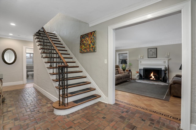 stairway with crown molding