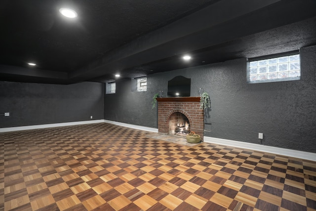 basement with a fireplace