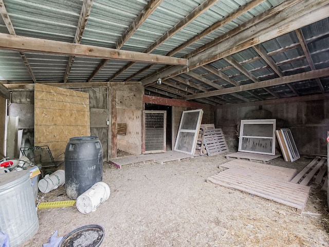 miscellaneous room with lofted ceiling