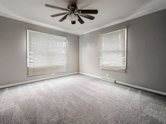 carpeted empty room with plenty of natural light, ornamental molding, and ceiling fan