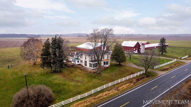 birds eye view of property featuring a rural view