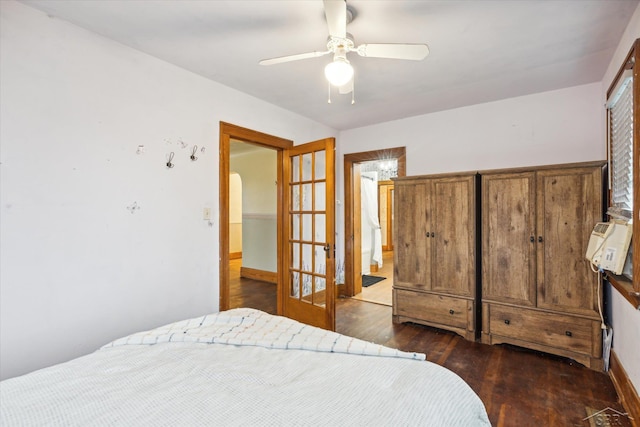 bedroom featuring ceiling fan and dark hardwood / wood-style flooring