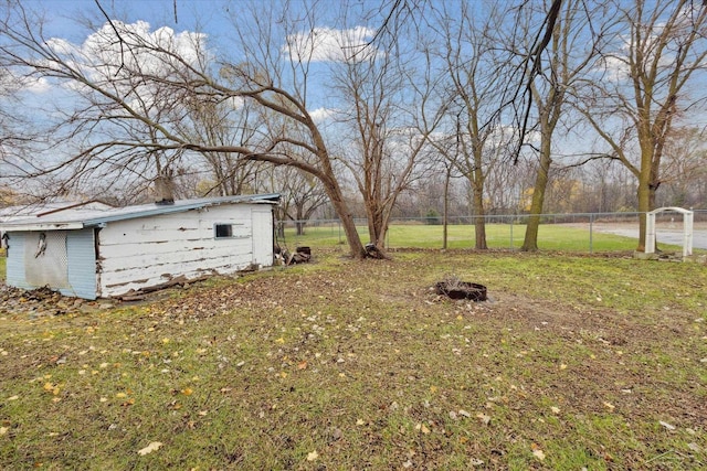 930 E Pine St, Sebewaing, MI 48759 - view of yard featuring an outbuilding