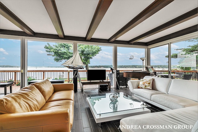 living room with beamed ceiling and dark hardwood / wood-style floors