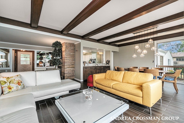 living room featuring beamed ceiling and dark wood-type flooring