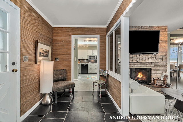 living area featuring a fireplace and ornamental molding