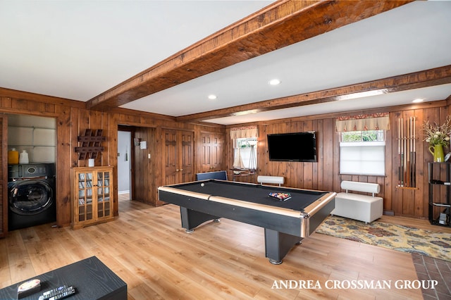 rec room featuring light hardwood / wood-style floors, beam ceiling, billiards, washer / clothes dryer, and wood walls