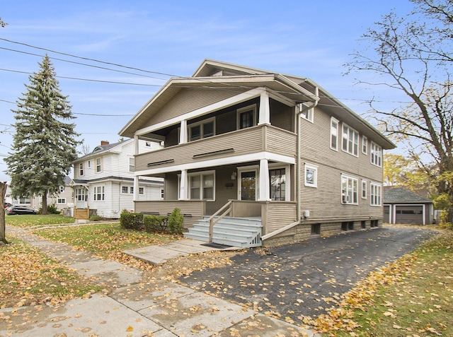 view of front of house featuring a balcony