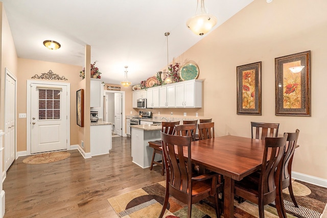 dining area featuring hardwood / wood-style floors