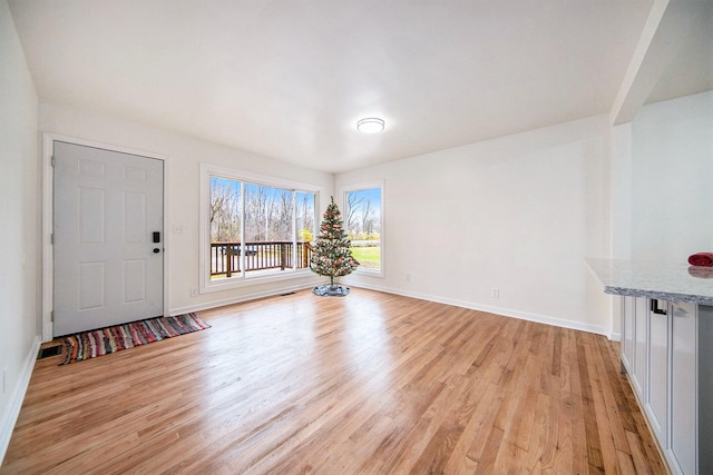 interior space with light hardwood / wood-style flooring