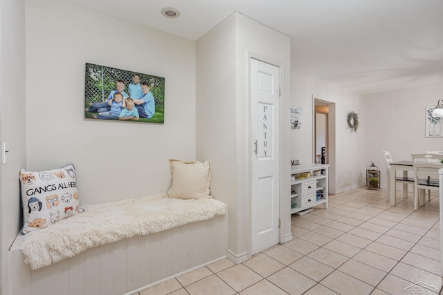 living area with light tile patterned flooring