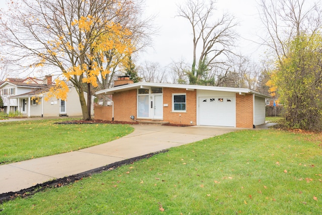 single story home with a garage and a front yard