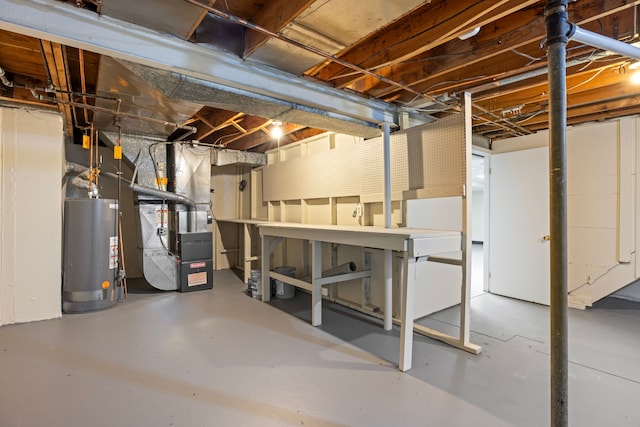 basement with heating unit and water heater