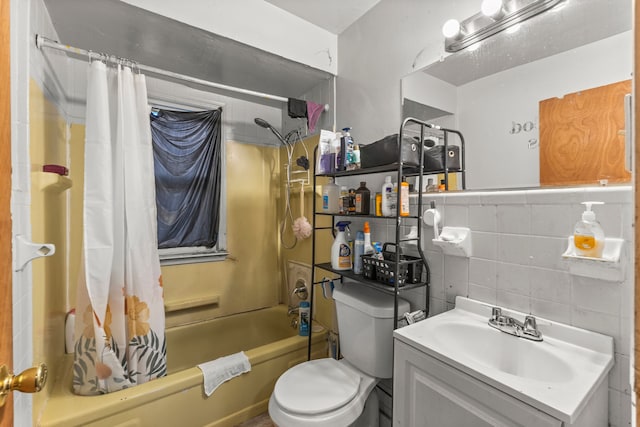 full bathroom with tasteful backsplash, toilet, shower / tub combo with curtain, vanity, and tile walls