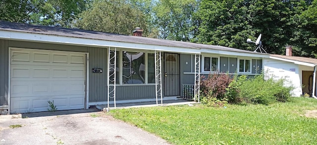 6165 Cypress Dr, Mount Morris, MI 48458 - single story home with a chimney, a porch, a front yard, and an attached garage