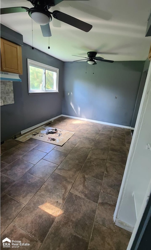 6069 Natchez Dr, Mount Morris, MI 48458 - unfurnished room featuring a ceiling fan and baseboards