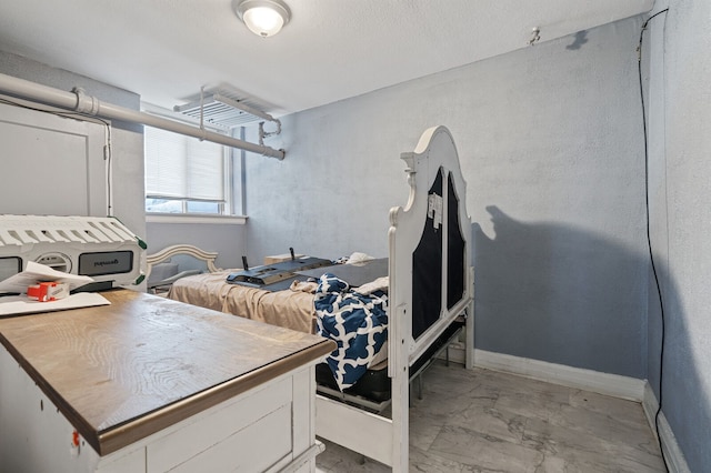 1055 Philip St, Detroit, MI 48215 - bedroom with light marble finish floors and baseboards