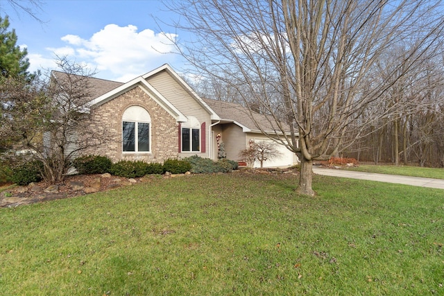 view of front facade with a garage and a front yard