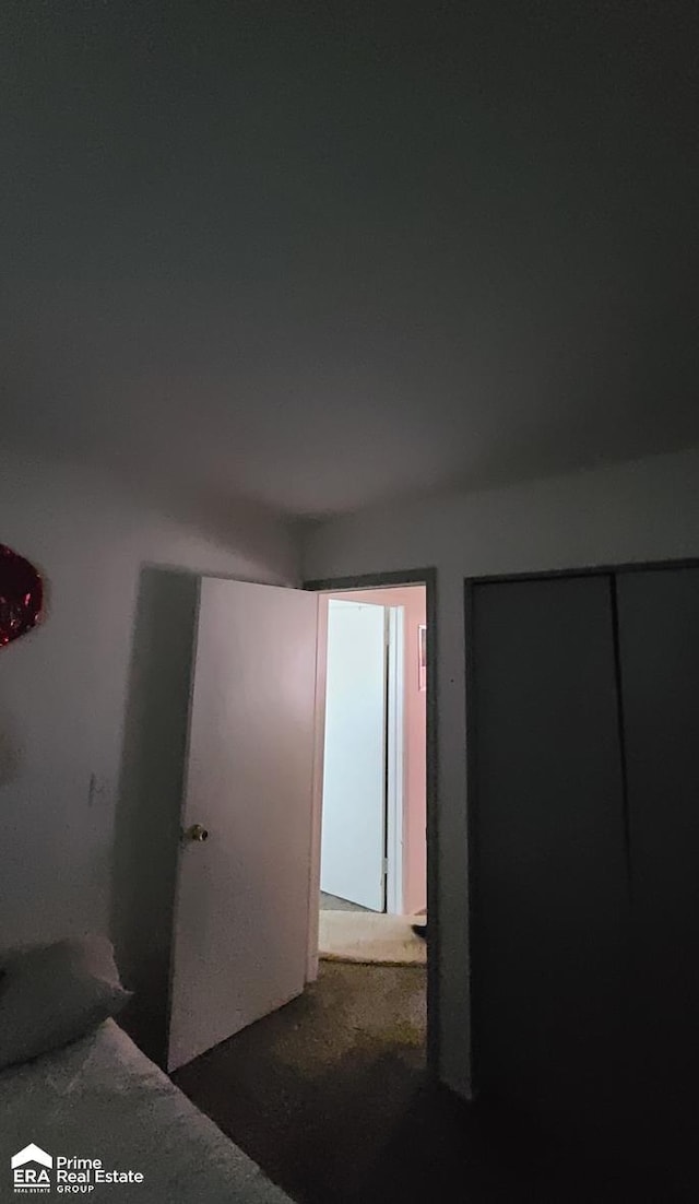 2273 Toby Beth Dr, Flint, MI 48505 - unfurnished bedroom featuring carpet flooring