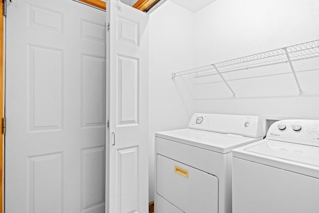 5279 Vinton Rd, Williamsburg, MI 49690 - washroom with independent washer and dryer