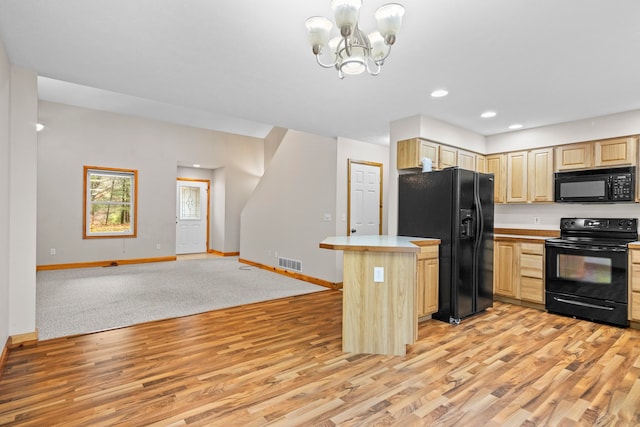 5279 Vinton Rd, Williamsburg, MI 49690 - kitchen featuring black appliances, light brown cabinetry, light wood-type flooring, baseboards, and recessed lighting