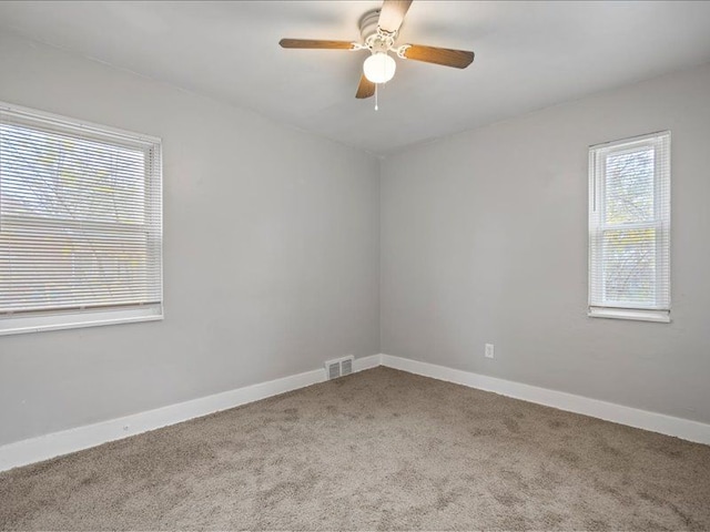 15778 Appoline St, Detroit, MI 48227 - spare room featuring carpet, ceiling fan, and baseboards