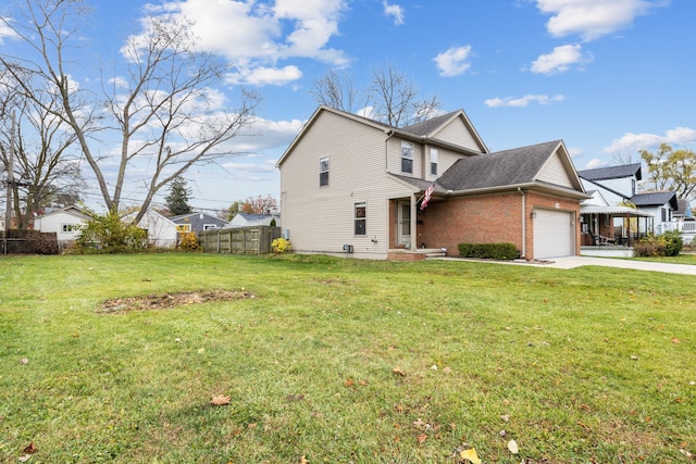 view of home's exterior featuring a yard and a garage