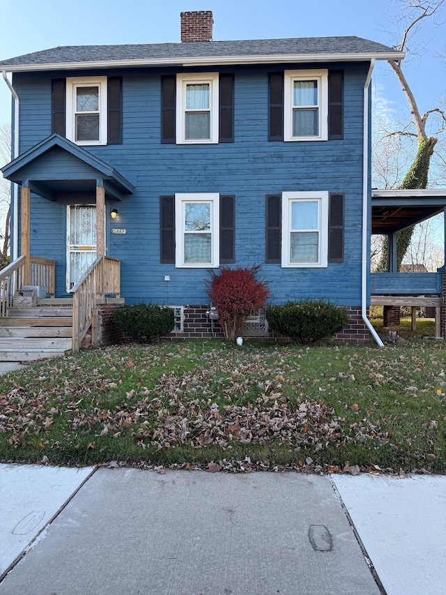 view of front of property featuring a front yard