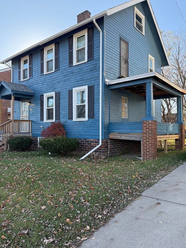 exterior space featuring a front lawn