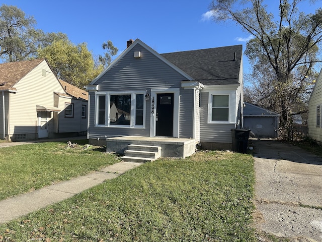 bungalow with a front yard