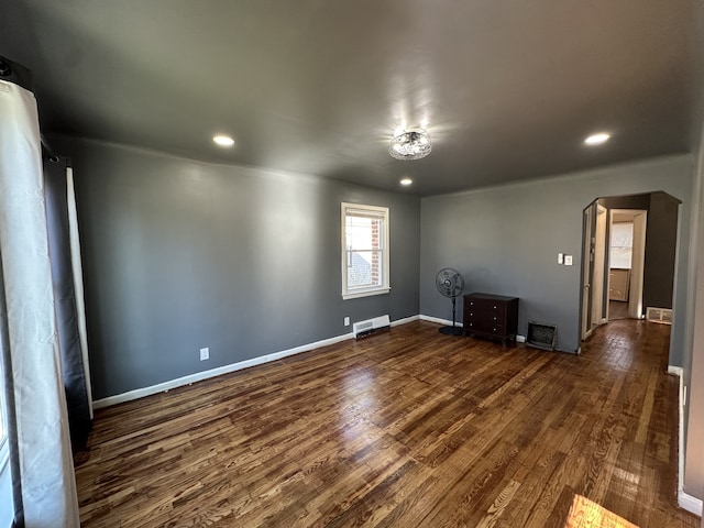 interior space with dark hardwood / wood-style flooring