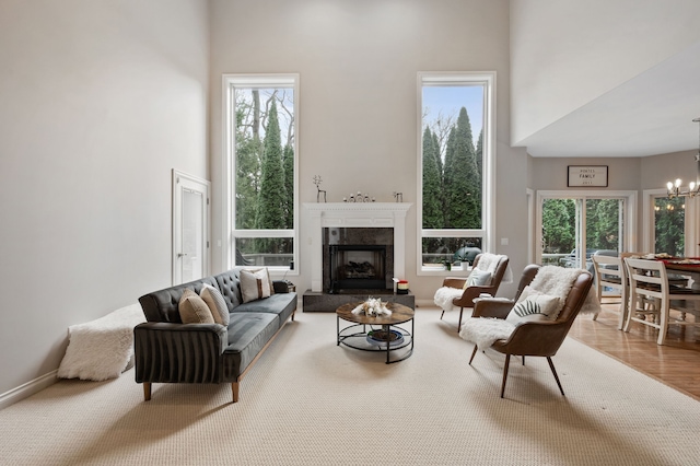 living room with a wealth of natural light and a high ceiling