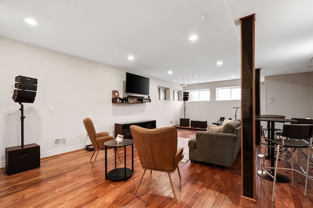 living room with hardwood / wood-style floors