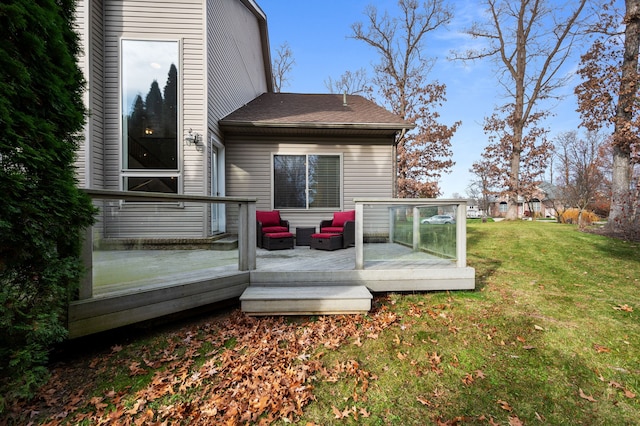 wooden terrace with a lawn