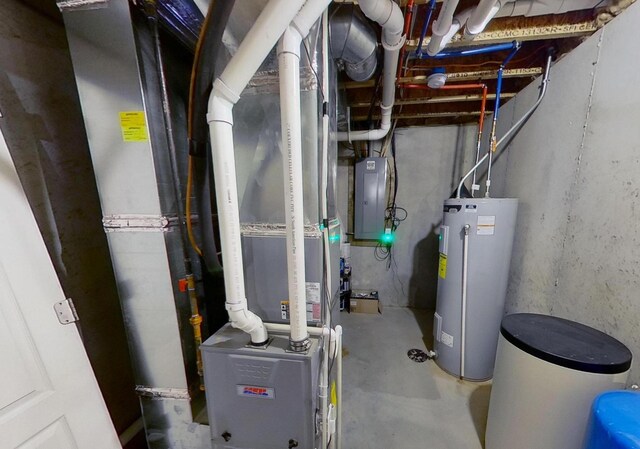 utilities with heating unit, electric panel, and water heater