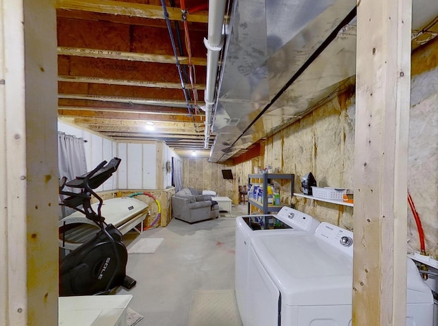 interior space with washing machine and clothes dryer