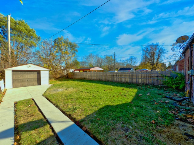 view of yard with an outbuilding and a garage