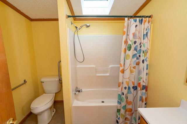 full bathroom with a skylight, shower / bath combination with curtain, toilet, vanity, and ornamental molding