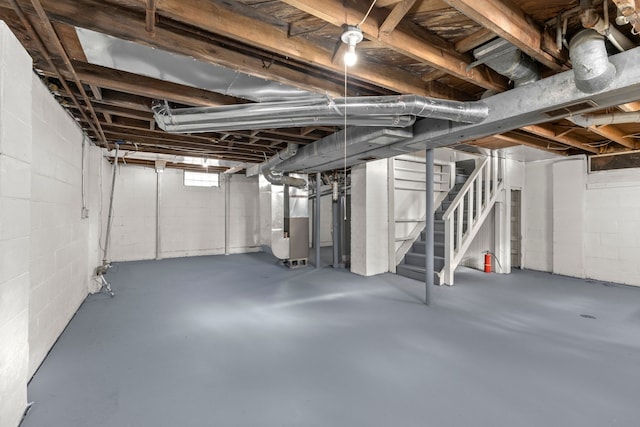 basement featuring heating unit